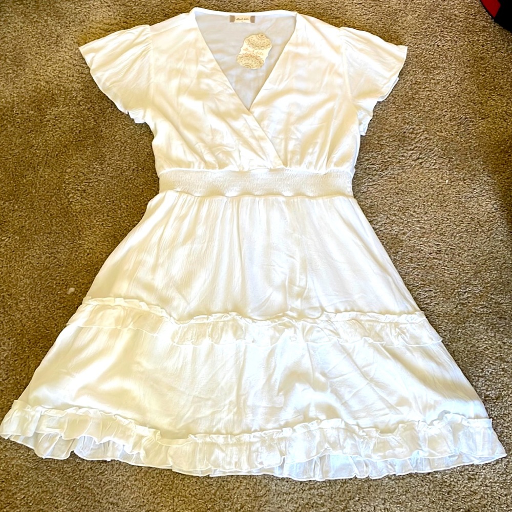White gauze dress with ruffle detail